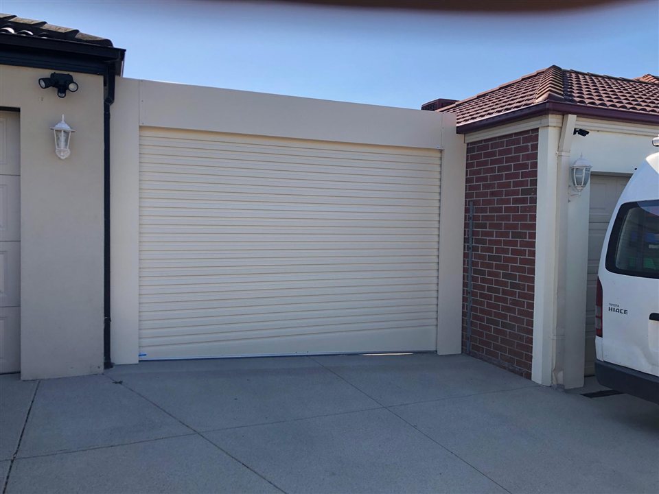 Cream roller door with tapered bottom rail